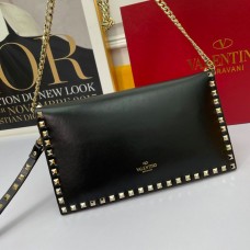 Valentino Garavani Large Rockstud Wristlet Clutch with Chain In Calfskin BlackGold