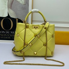 Valentino Garavani Meidum Roman Stud Handbag In Nappa Lambskin Yellow